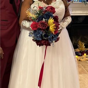 Custom wedding dress. Size 22/24 with 9ft custom bling veil and wedding gloves.